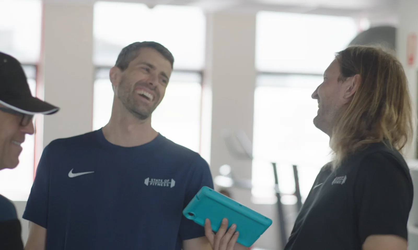 Dylan and Alwyn, coaches at State of Fitness, laughing between sessions at the South Yarra studio