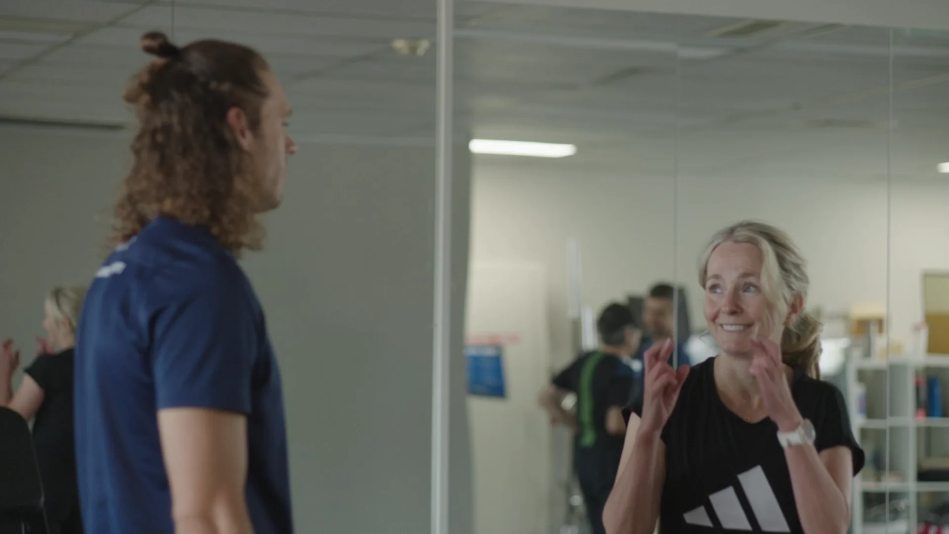 Scott talking with a member between sets at the South Yarra studio