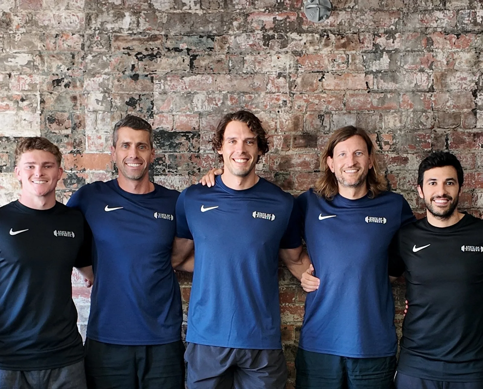The five State of Fitness coaches together at the South Yarra studio