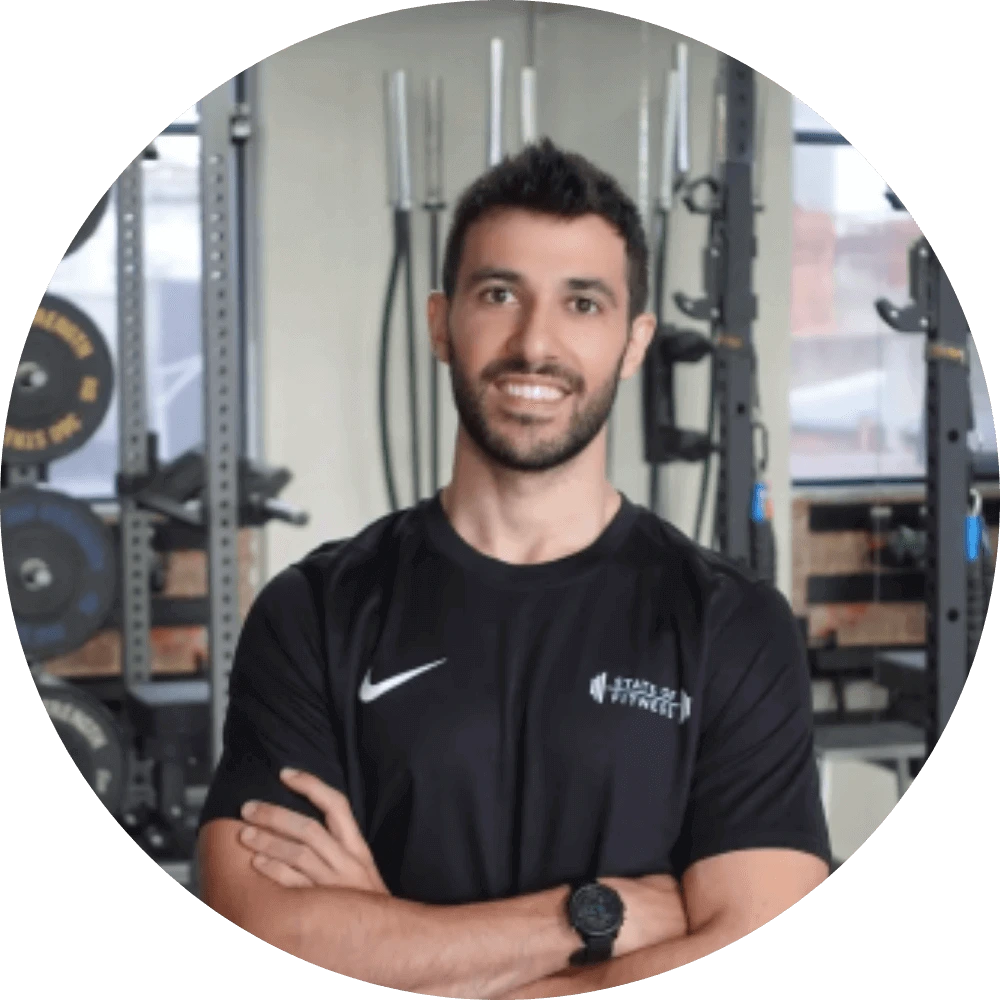 Alessandro Villadoro - a State of Fitness Coach posing for the camera, showing his commitment to fitness and health.