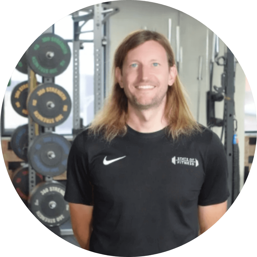 Alwyn Jones, Head of Athletic Development at State of Fitness, looks motivated and prepared for a workout.